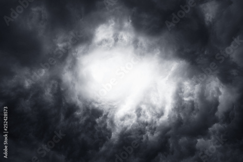 Scary epic sky with menacing clouds. Hurricane wind with a thunderstorm. Stock background, photo