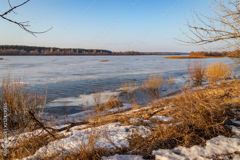Deep river on the eve of ice drift in the spring in March. Deep river on the eve of ice drift in the spring in March.