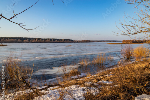 Deep river on the eve of ice drift in the spring in March.