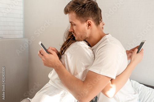 Foto Young couple in the bedroom