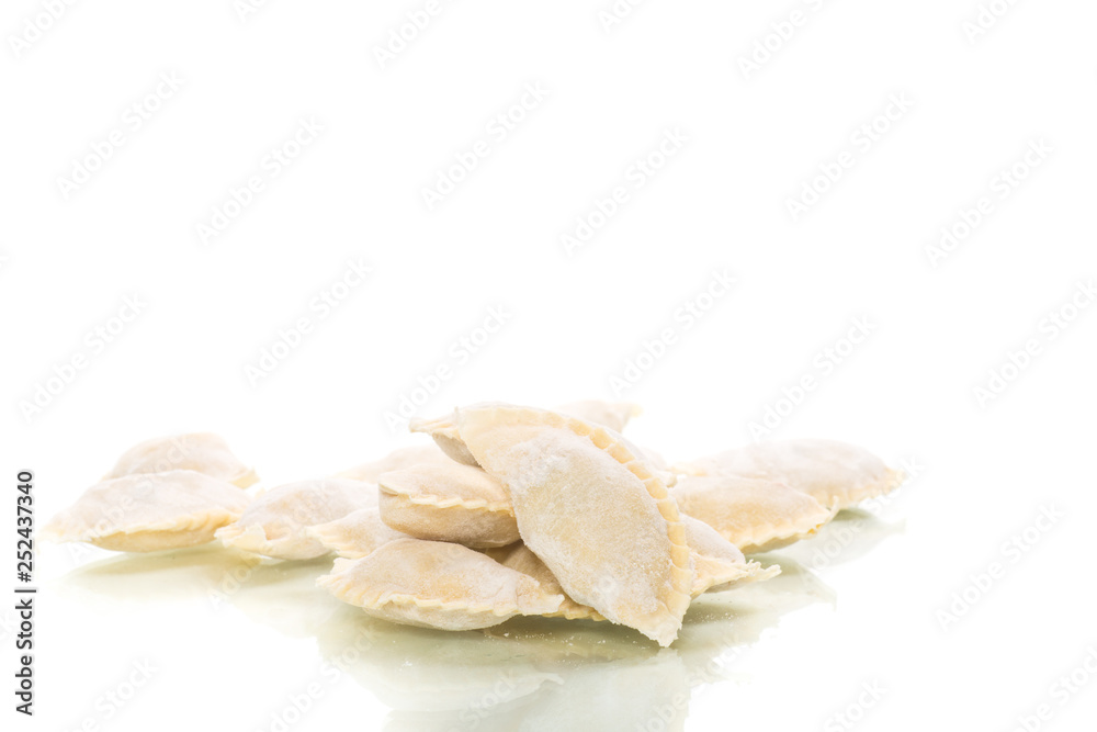 Dumplings raw with stuffing on a white background Dumplings raw with stuffing on a white background