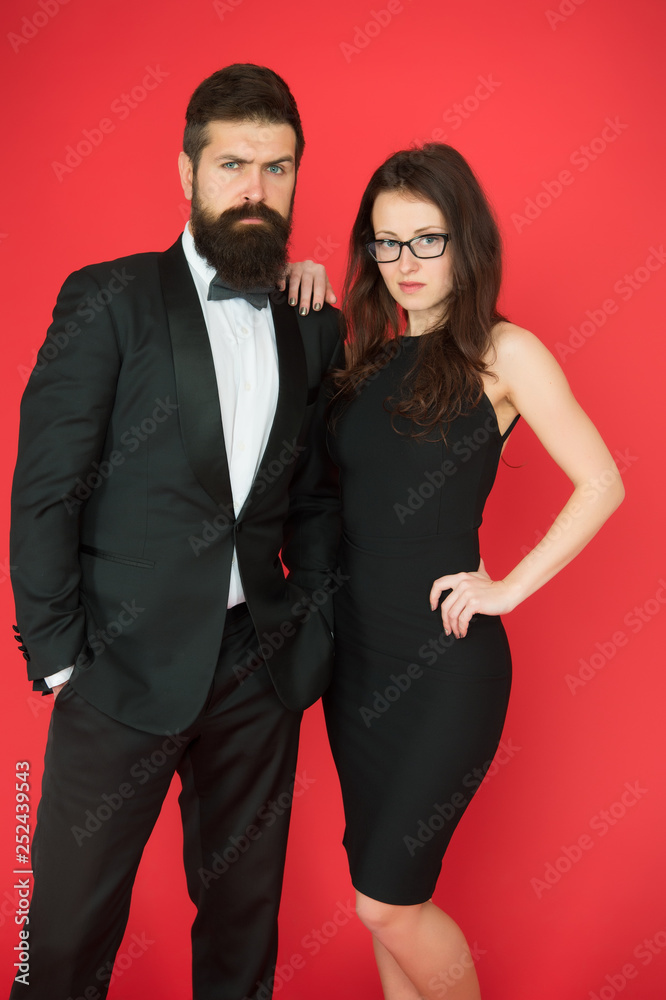 He will melt your heart. Bearded man and woman dating. couple in love on date. Formal couple of man in tuxedo and sexy woman. romantic date. formal fashion look. Proposal or engagement party. Romance