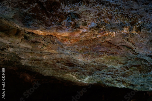 beautiful illuminated sealing of cave different colors