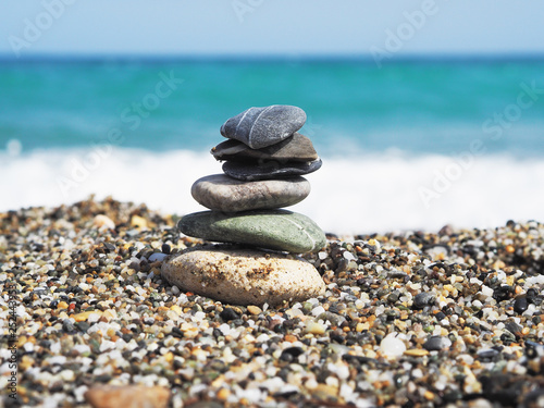 Sea stones and blue sea background.Sunny day.