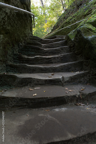 Old stair carved in stone on the mountainside.