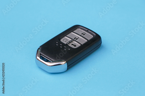 Intelligent Car Keys isolated on blue background.