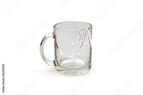 Broken cup isolated on a white with clipping path, cracked glass