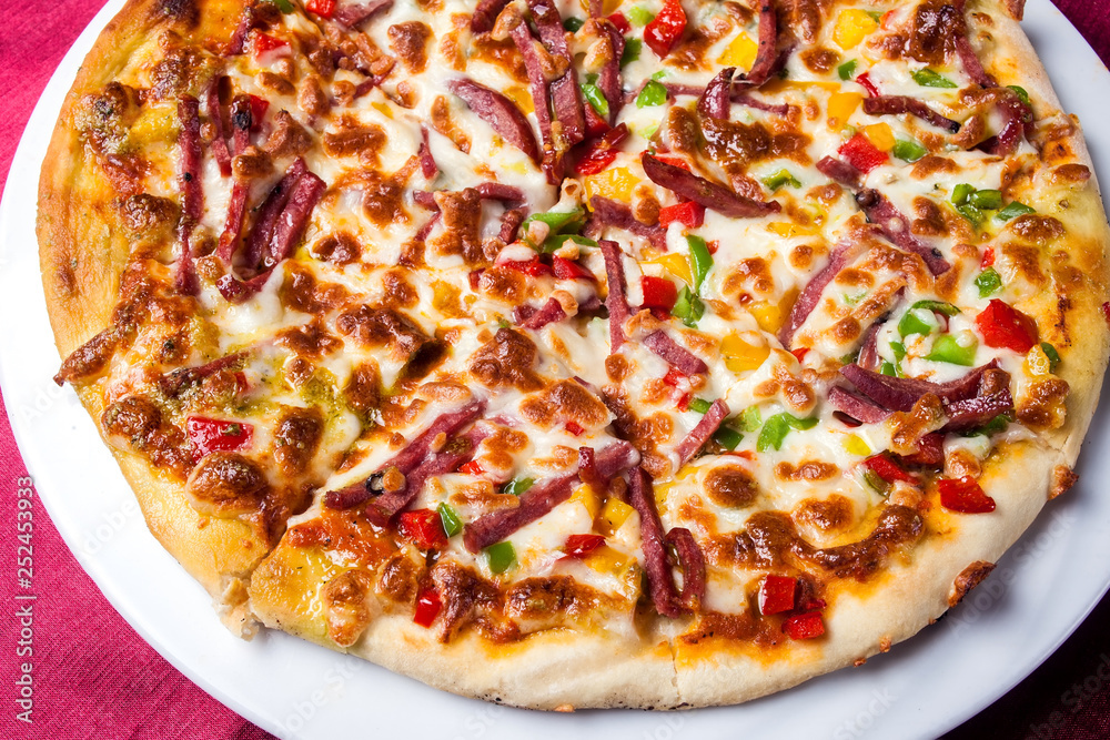 Delicious pizza with with sauces on the table. Food concept Delicious pizza with with sauces on the table. Food concept