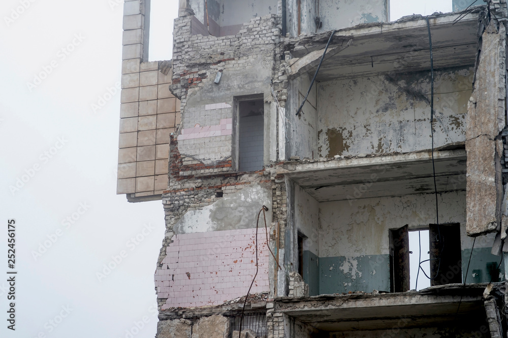 The remains of the frame of a large concrete building close-up. Background.
