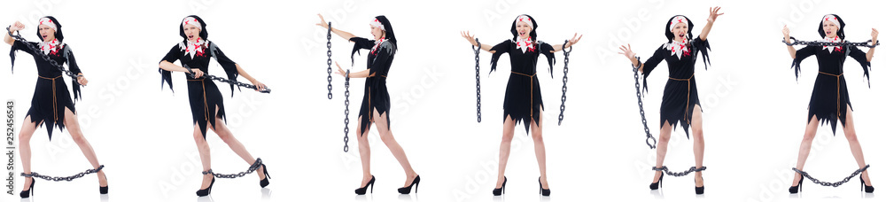 Young beautiful nun with shackles isolated on white Young beautiful nun with shackles isolated on white
