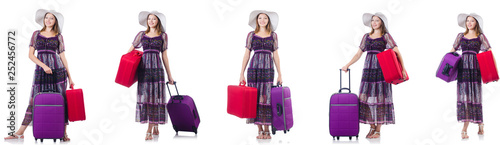 Young woman with suitcases isolated on white