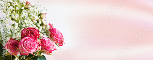 delicate bouquet of roses banner with copy space © aninna