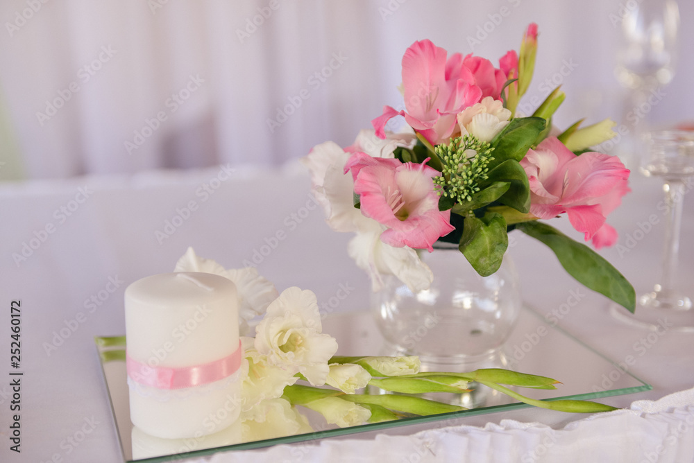 simple wedding table setting with a plate, spoon, fork and a sprig of lilac with a sign for the guest's name simple wedding table setting with a plate, spoon, fork and a sprig of lilac with a sign for the guest's name