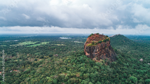 The Lion's Rock in Sigiriya, Sri Lanka. Aerial view of the tropical forest with mountains