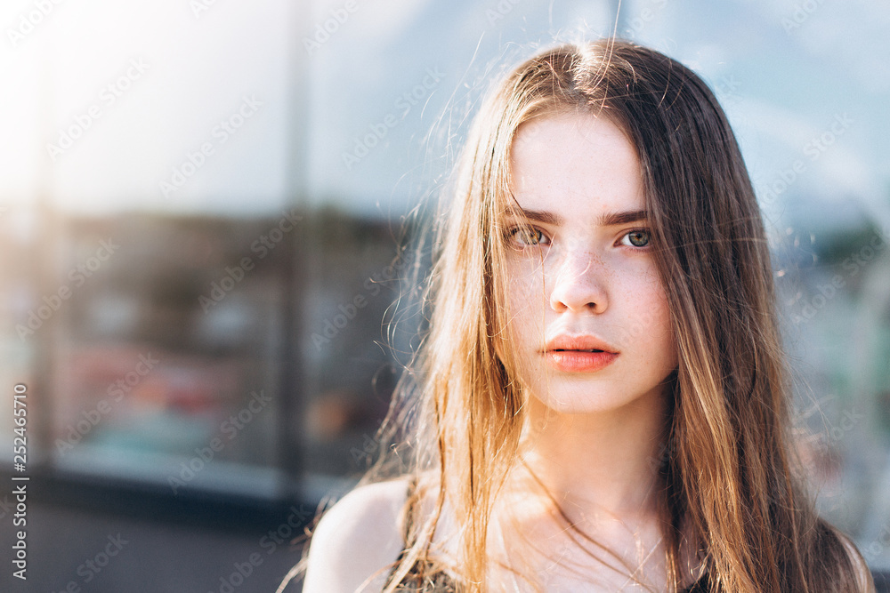 Portrait of caucasian sensual emotional teen depressed girl outdoors. Adolescence, urban, beauty concept Portrait of caucasian sensual emotional teen depressed girl outdoors. Adolescence, urban, beauty concept