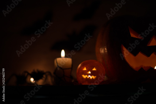 composition for Halloween.sinister pumpkin on a dark background © yurolaitsalbert
