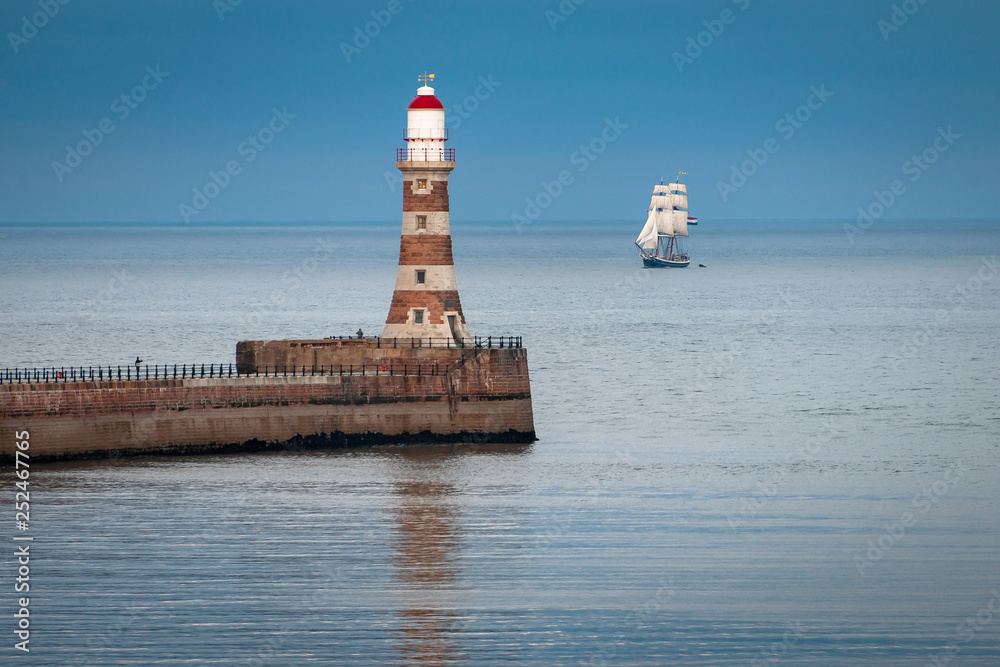 Lighthouse and Tall Ship
