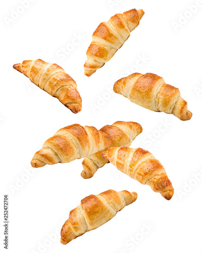 Falling croissant, isolated on white background, clipping path, full depth of field