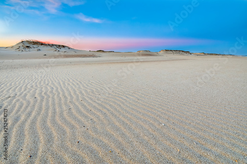 Uruguayan wild lonely beaches and idyllic sea landscapes at Uruguay coastline. Here we can see the twilight sky lights over Cabo Polonio sand dunes  an awe wild environment at Cabo Polonio beach