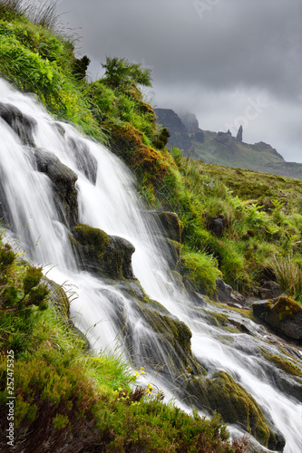 Bride's Veil WaterFalls to Loch Leathan at The Storr with Old Man of Storr peak in clouds on Isle of Skye Inner Hebrides Scotland UK