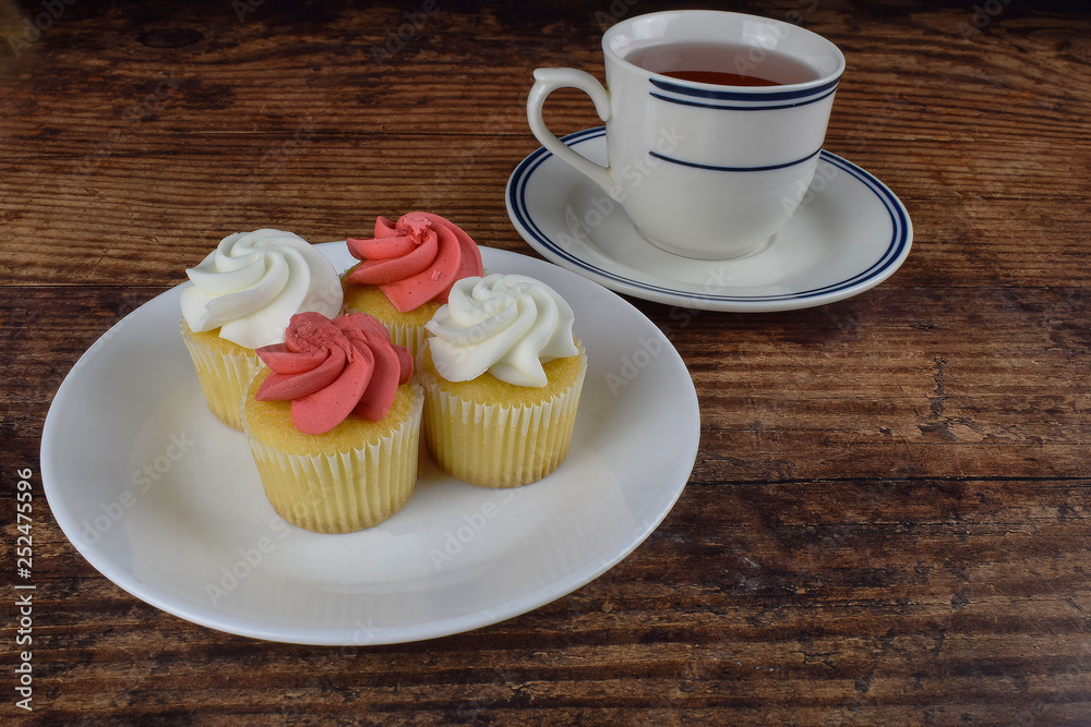 mini cup cakes and and a cup of tea mini cup cakes and and a cup of tea