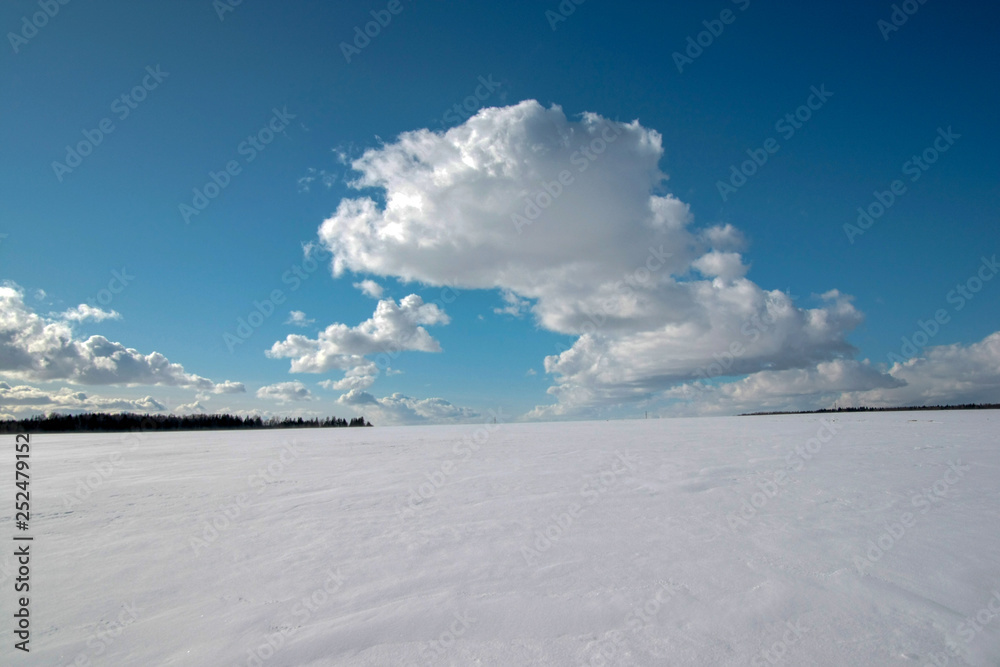 Beautiful sunny winter day with white clouds Beautiful sunny winter day with white clouds