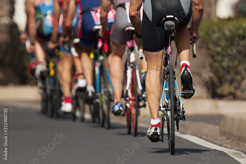 Fototapeta Naklejka Na Ścianę i Meble -  Cycling competition cyclist athletes riding a race at high speed
