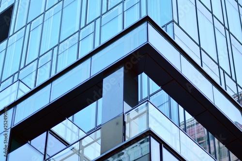 The windows of a modern building for offices. Business buildings architecture.