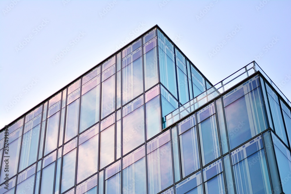 The windows of a modern building for offices. Business buildings architecture. The windows of a modern building for offices. Business buildings architecture.