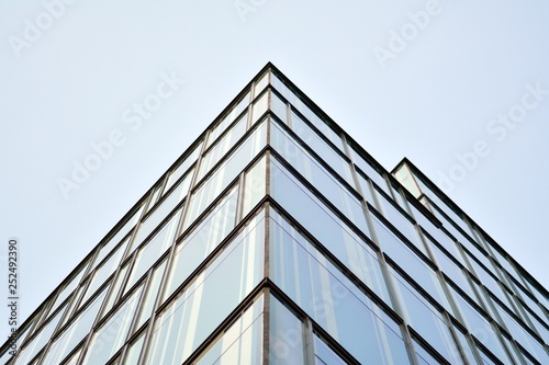 The windows of a modern building for offices. Business buildings architecture.