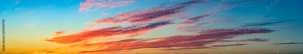Fototapeta premium Panorama of the sky during sunset. Nature background of the colorful panorama sky
