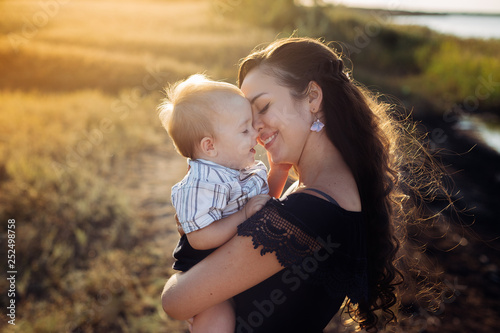 Portrait of a young mother with his son