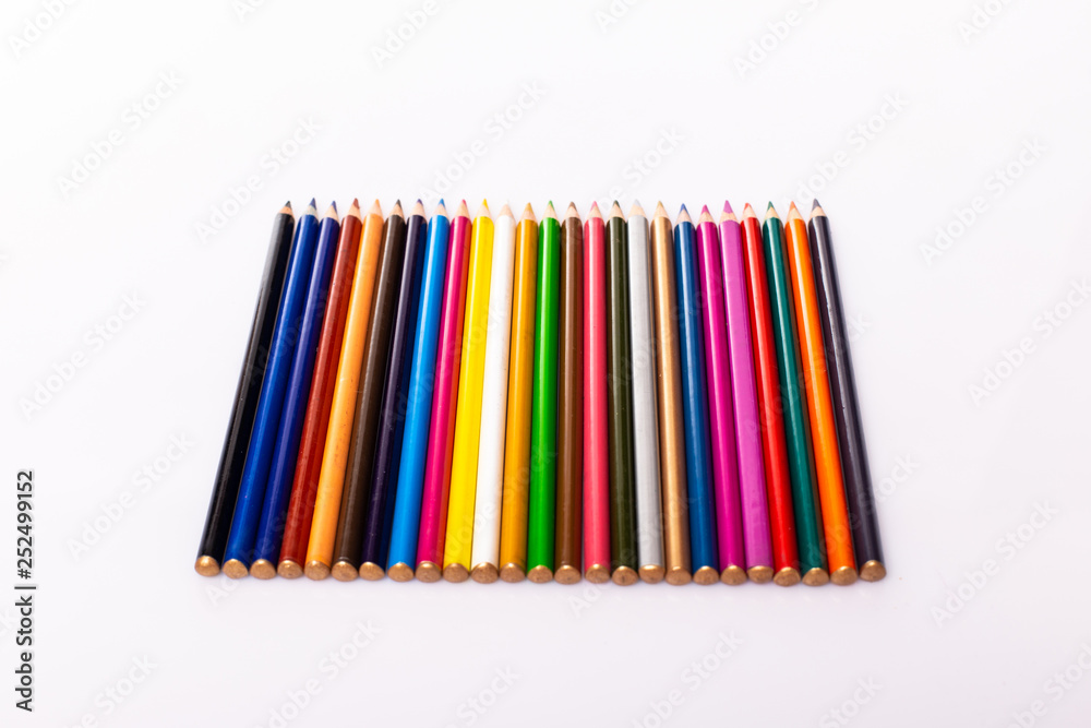 Color pencils isolated on white background. Close up. Color pencils isolated on white background. Close up.