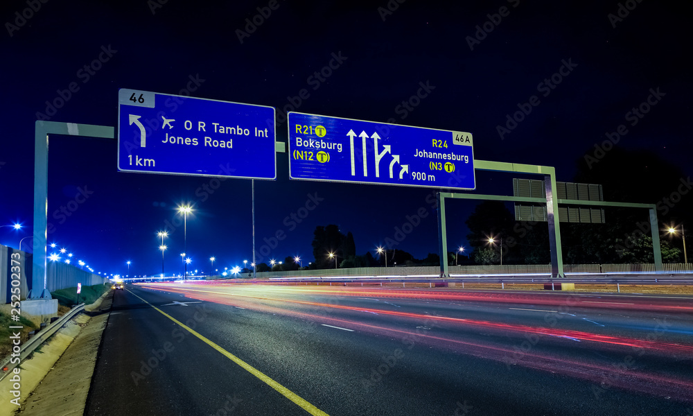 Motorway Signs on Highway at night