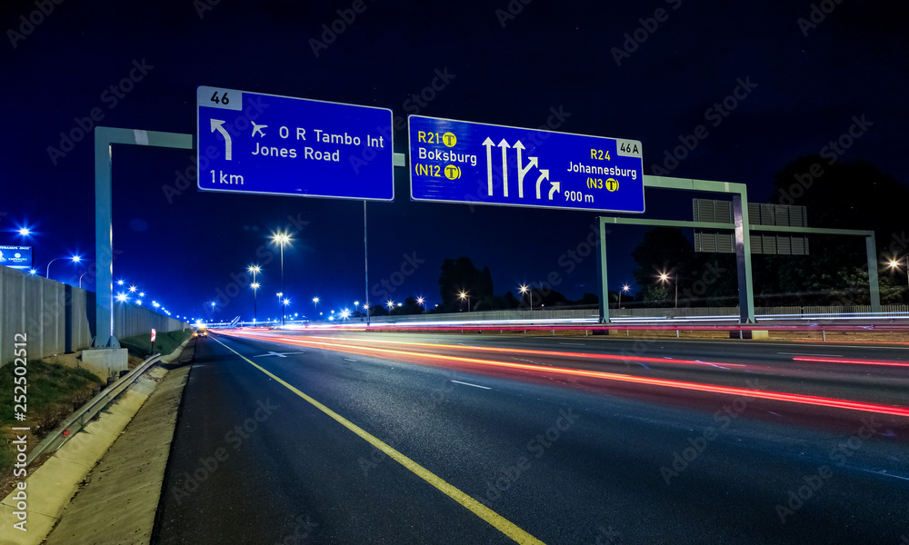 Motorway Signs on Highway at night
