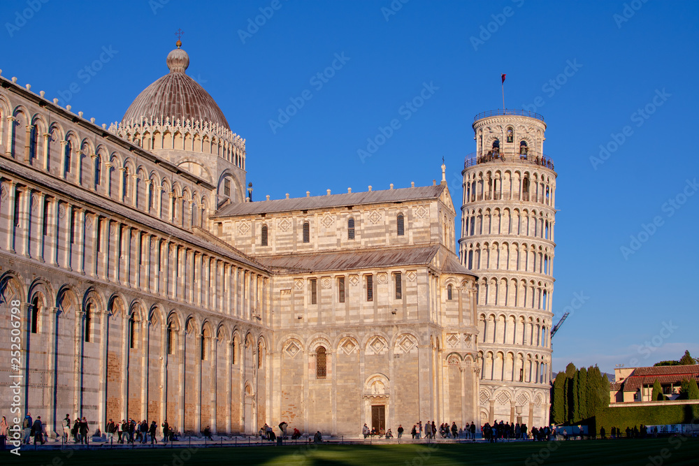 Pisa,tuscany/Italy 23 february 2019 :the Cathedral of Pisa and the legendary leaning tower in a bright but cold sunny day