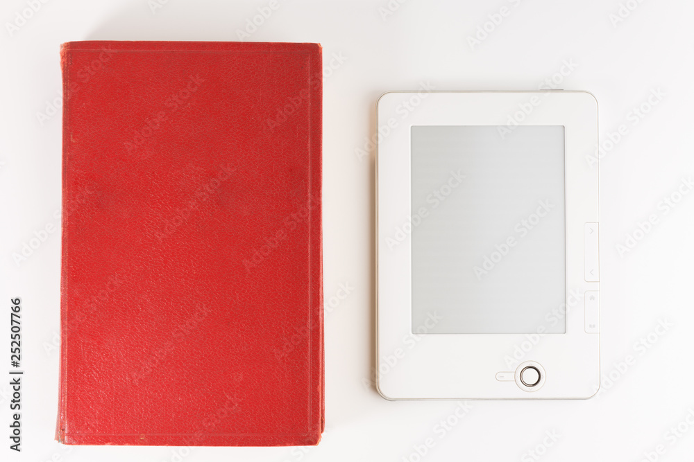 Digital e-book reader with a blank screen with old paper book isolated on white background Digital e-book reader with a blank screen with old paper book isolated on white background