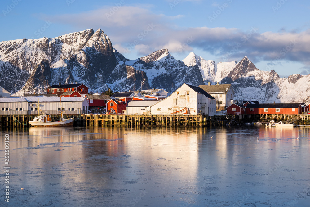 Little fishing village Hamnoy and Sakrisoy on Lofoten (Norway) seen during a beautiful sunrise in winter
