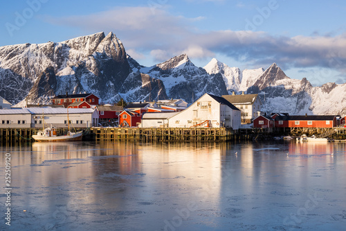 Little fishing village Hamnoy and Sakrisoy on Lofoten (Norway) seen during a beautiful sunrise in winter