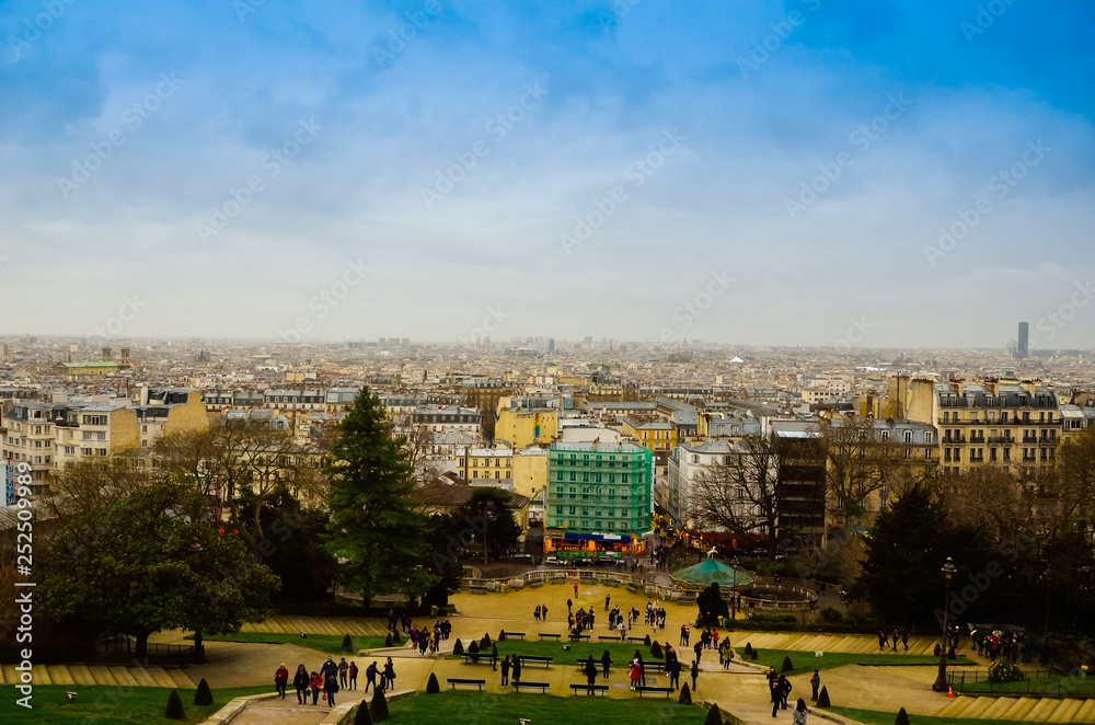 Romantic panorama view of metropolitan old European city under cloudy blue sky