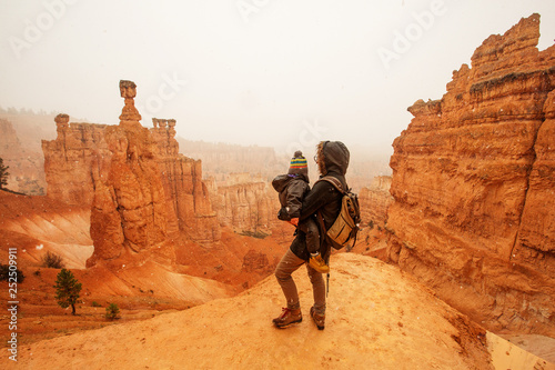 Mother with son are hiking in Bryce canyon National Park  Utah  USA