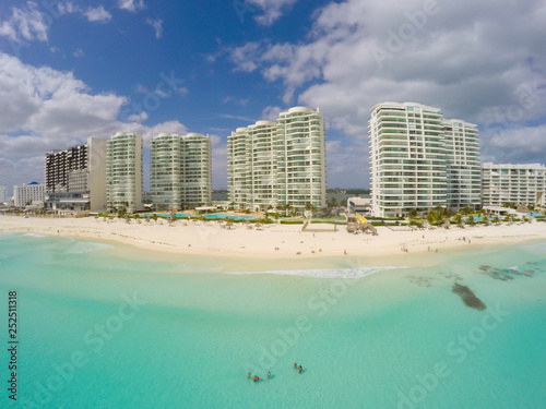 Aerial view on Turquoise water in Caribbean Sea, Chac Mol Beach and Resorts in Cancun Mexico 