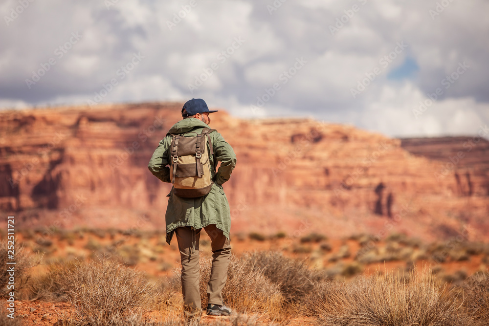 Hiker in Valley of Gods, USA Hiker in Valley of Gods, USA