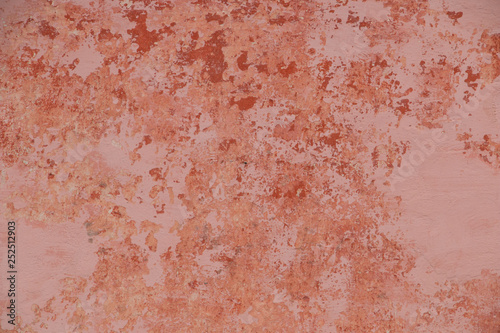 Vintage wall texture. Grunge background with pink speckled paint © aerial333
