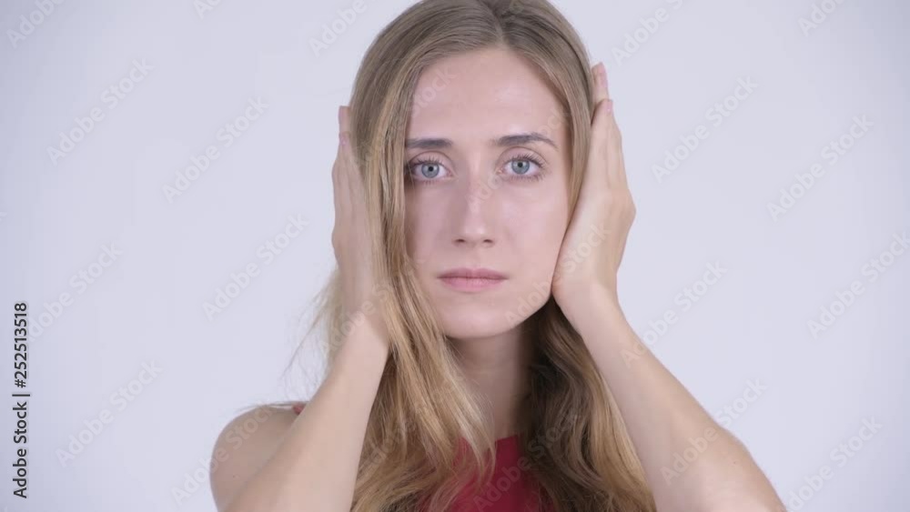 Face of young beautiful blonde woman showing three wise monkeys concept Face of young beautiful blonde woman showing three wise monkeys concept
