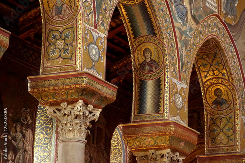 MONREALE, SICILY - NOV 28, 218 - Inlaid  mosaics on  columns of Cathredral Monreale, Sicily, Italy. photo