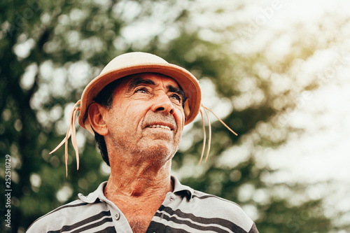 Portrait of Brazilian Northeastern cowboy wearing his typical leather hat. photo