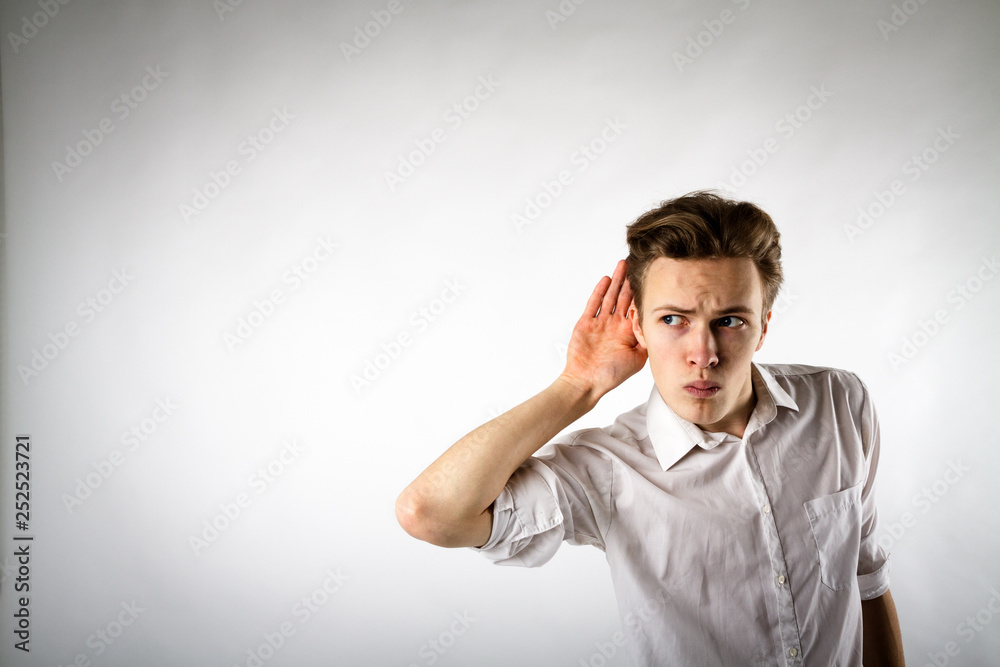 Φωτογραφία Curious young man in white