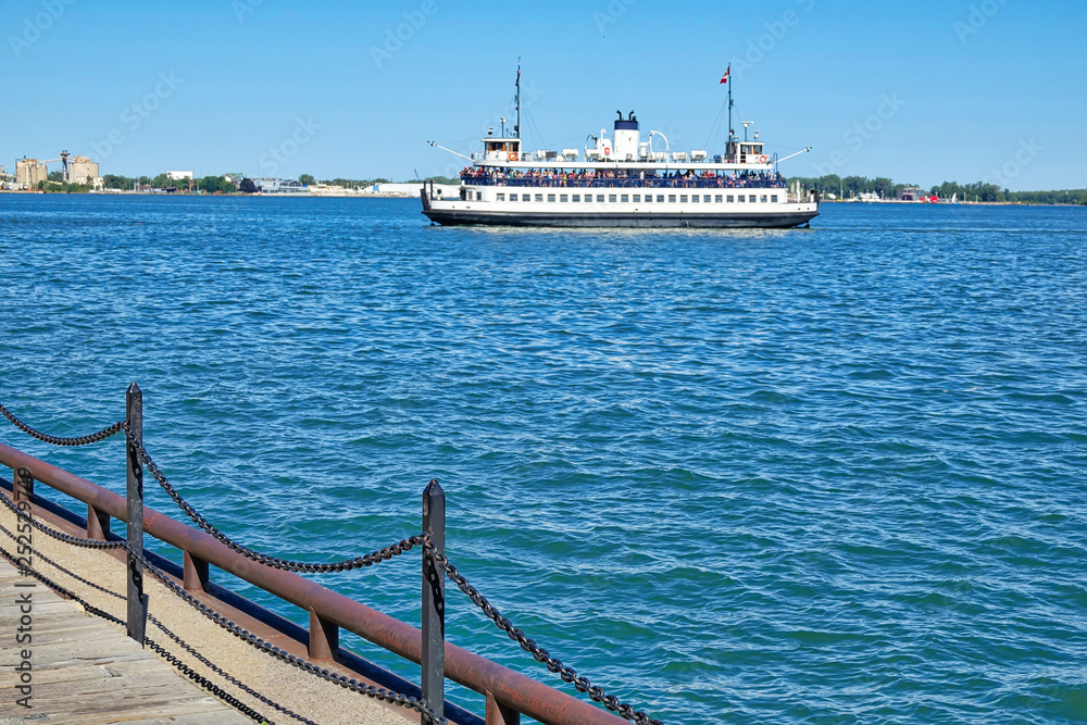 Fototapeta Toronto, Ontario, Canada-10 June, 2018: Toronto Islands Ferry bringing passenger