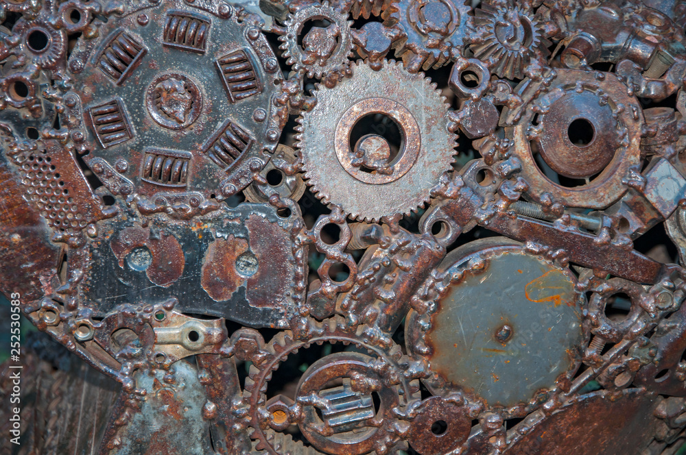 Old, worn, rough mechanical gears made of rusty metal. Design minimalism. Iron composition. Retro style. Stylish top and trendy design background round gears. Old, worn, rough mechanical gears made of rusty metal. Design minimalism. Iron composition. Retro style. Stylish top and trendy design background round gears.